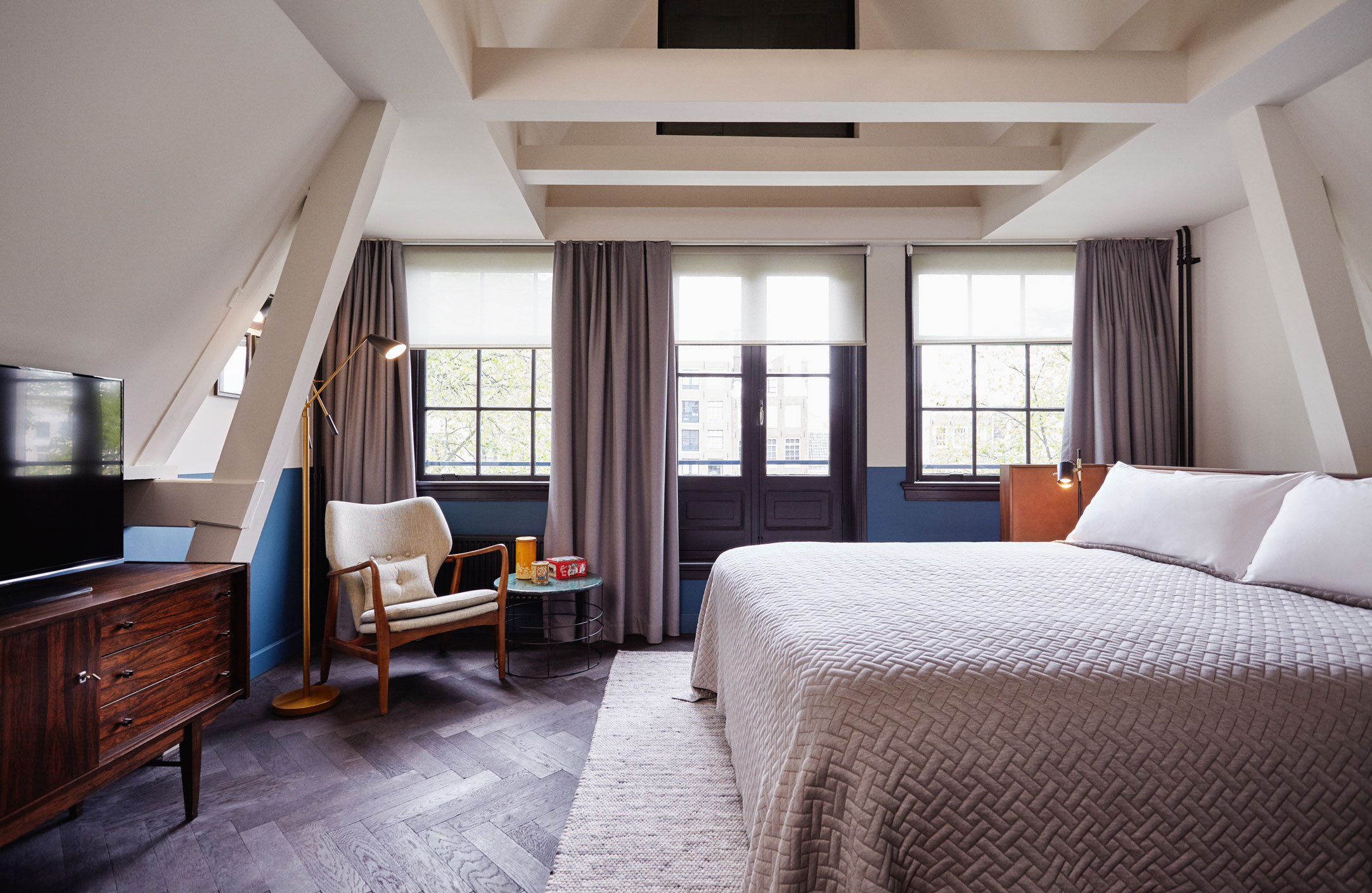 Roomy Canal View showing bed and chair