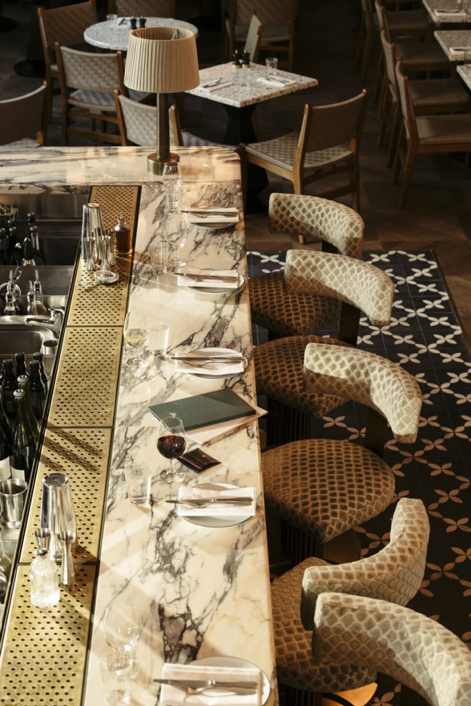 Seats at the bar area ready for service at Albie