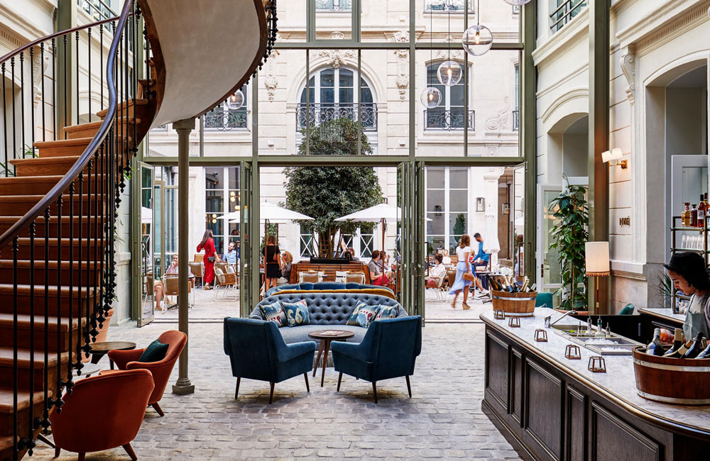 Spiral staircase, café bar and lounge seating in the lobby