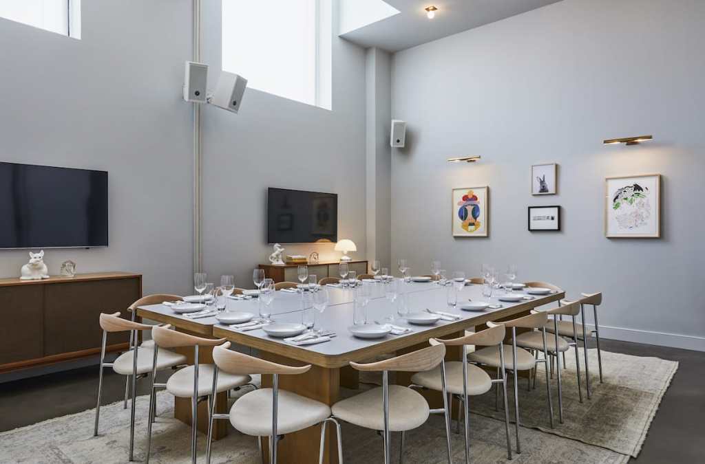 Two tables pushed together to create more space for guests dining