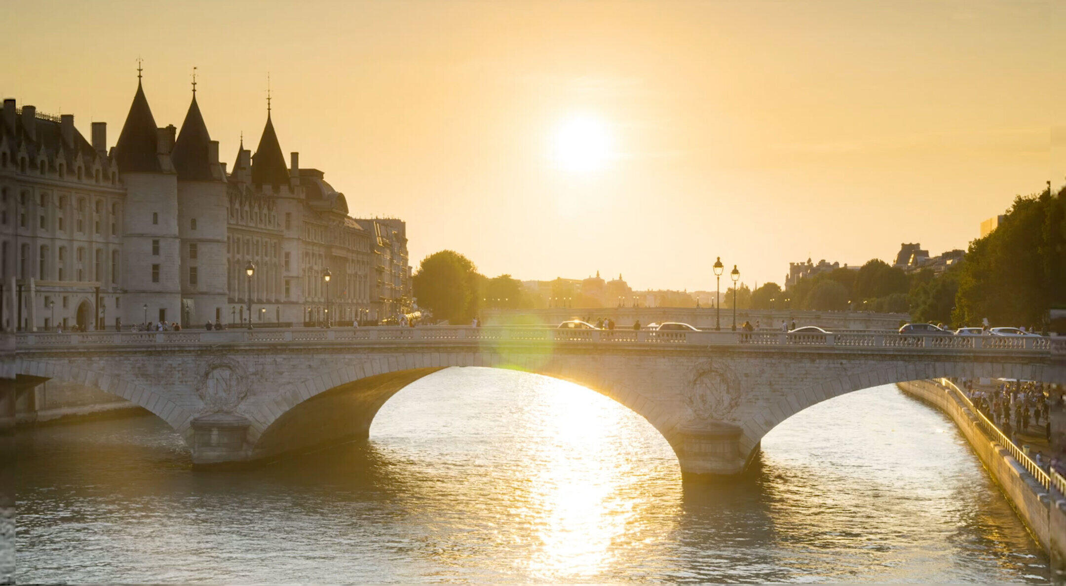 Bridge in Paris with sun going down