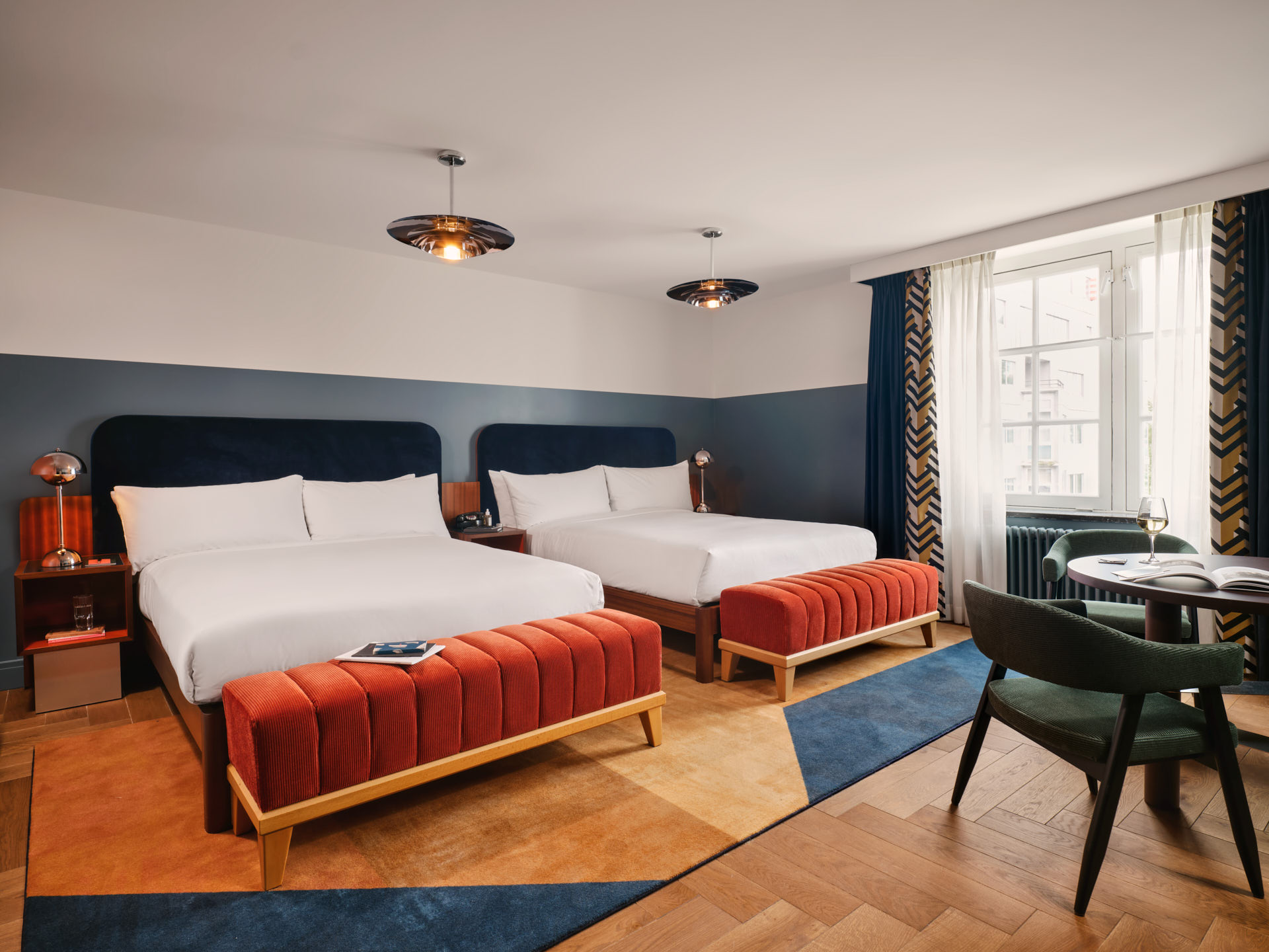 Wide shot of Biggy Double Up room with two big beds in parallel with plenty of space