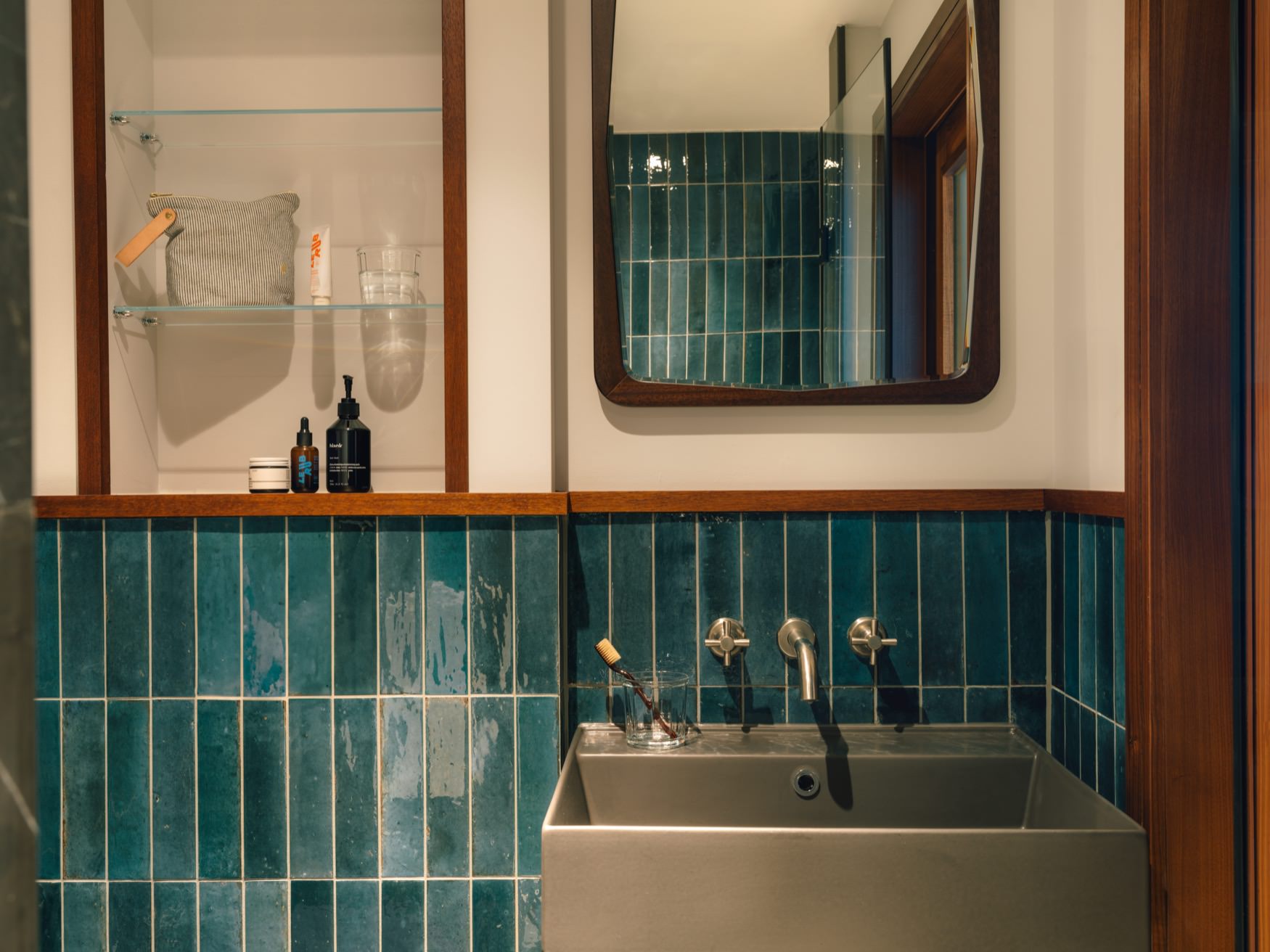 View of the bathroom sink and mirror