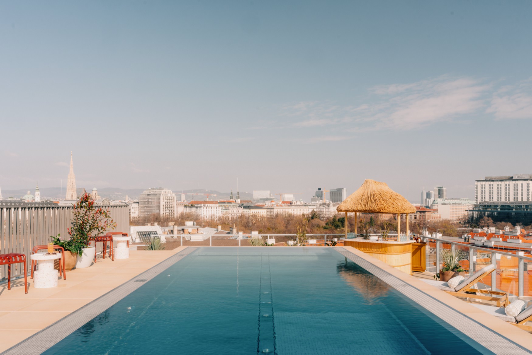 View of the pool and city landscape.